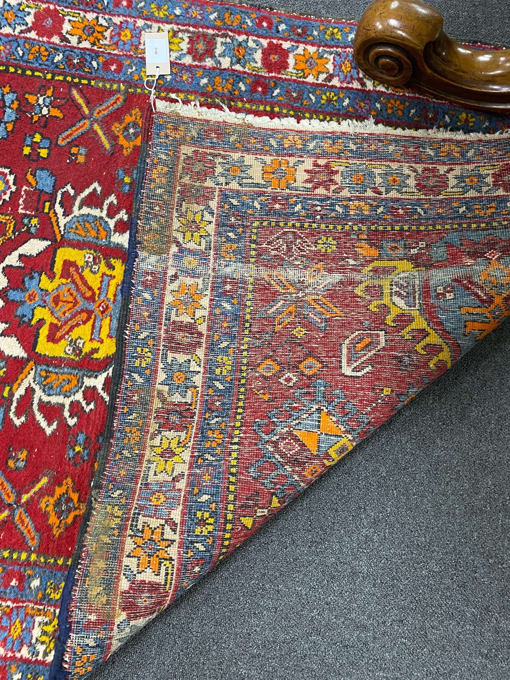 A North West Persian red ground runner, 426 x 100cm